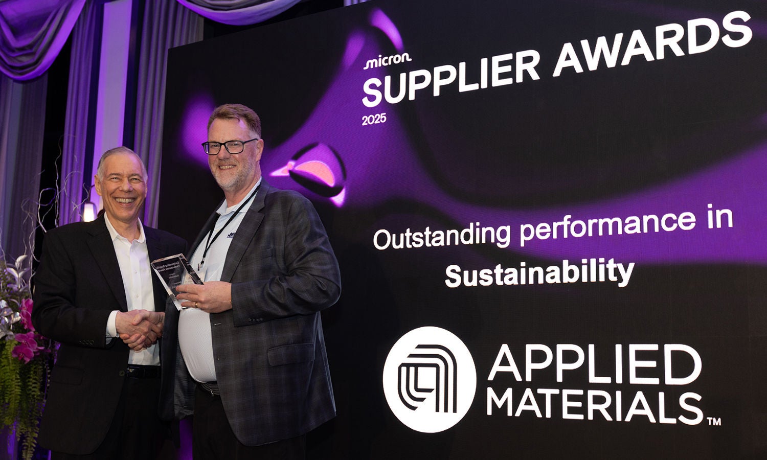 Scott DeBoer presenting the Outstanding Performance Award to Gary Dickerson